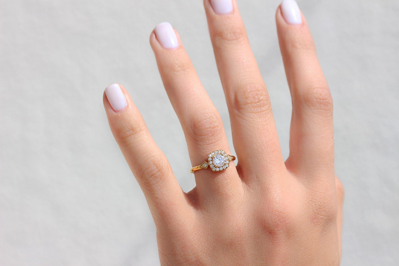 Koor Engagement Ring with a Round Cut Diamond and Halo