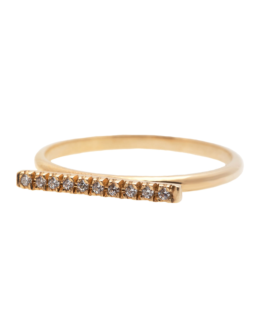 A dainty 14k yellow gold ring, with a horizontal bar on top, set with ten tiny white diamonds.