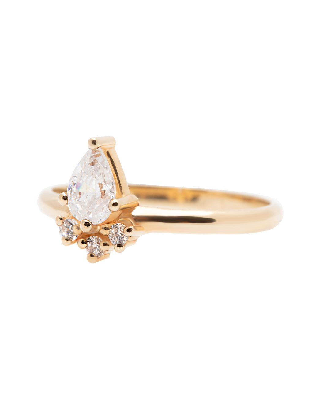 A 14k yellow gold engagement ring, set with a center pear cut white diamond and and halo of three small white diamonds.