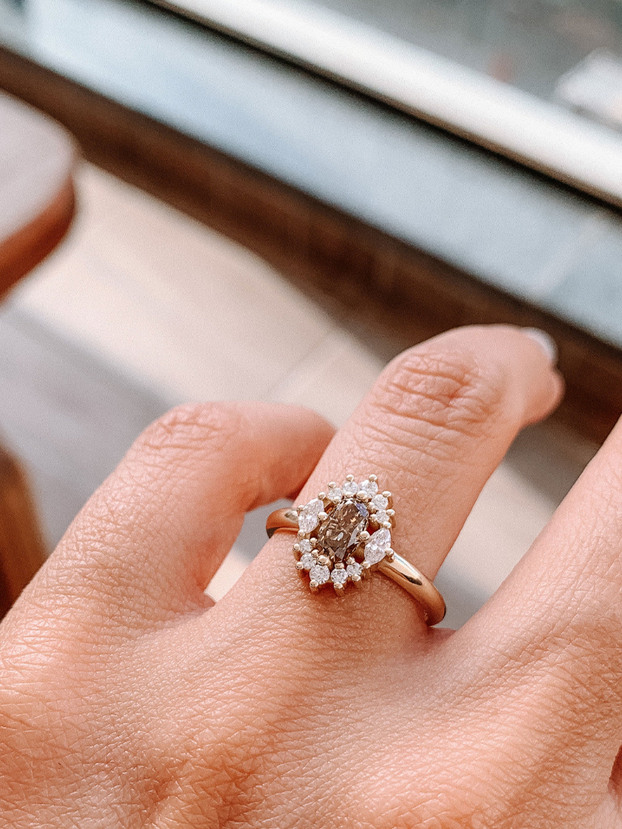 Golden Brown Diamond Ring with an Oval Cut Diamond