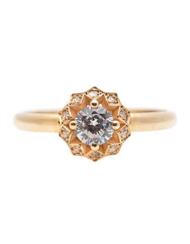 Niva Engagement Ring with a Lab Grown Oval Cut Diamond and Two Natural Triangle Cut Diamonds