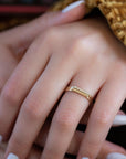 A dainty 14k yellow gold stackable ring.