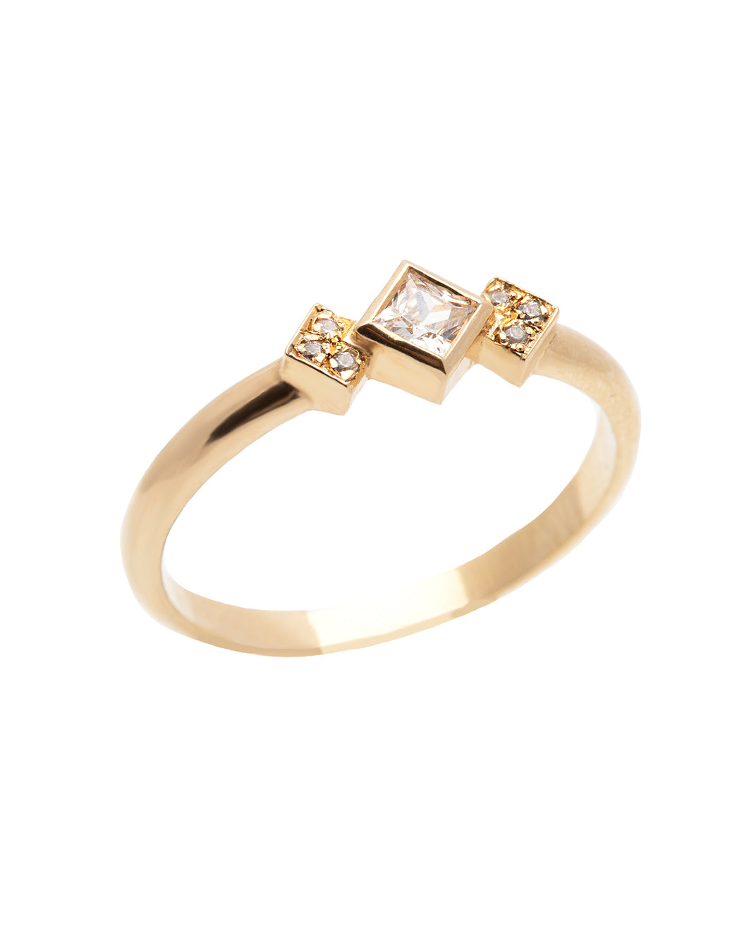A delicate 14k yellow gold engagement ring, set with a center 0.25 carat princess cut white diamond, and three 0.01 carat brilliant cut white diamonds on each side.